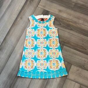 Vibrant Turquoise Kids Dress with Orange Patterns